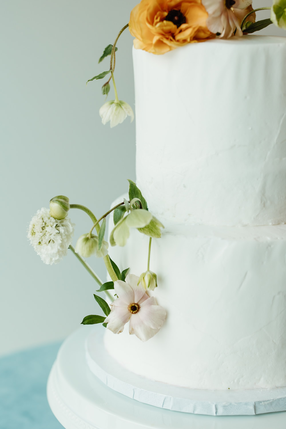Floral wedding cake. Photo by Olivia Doerfler Photography.